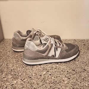 New Balance 574 charcoal color size 9